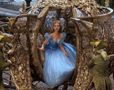 Cinderella (Lily James) arrives at the ball in her pumpkin convertible.  Image: Disney Productions 